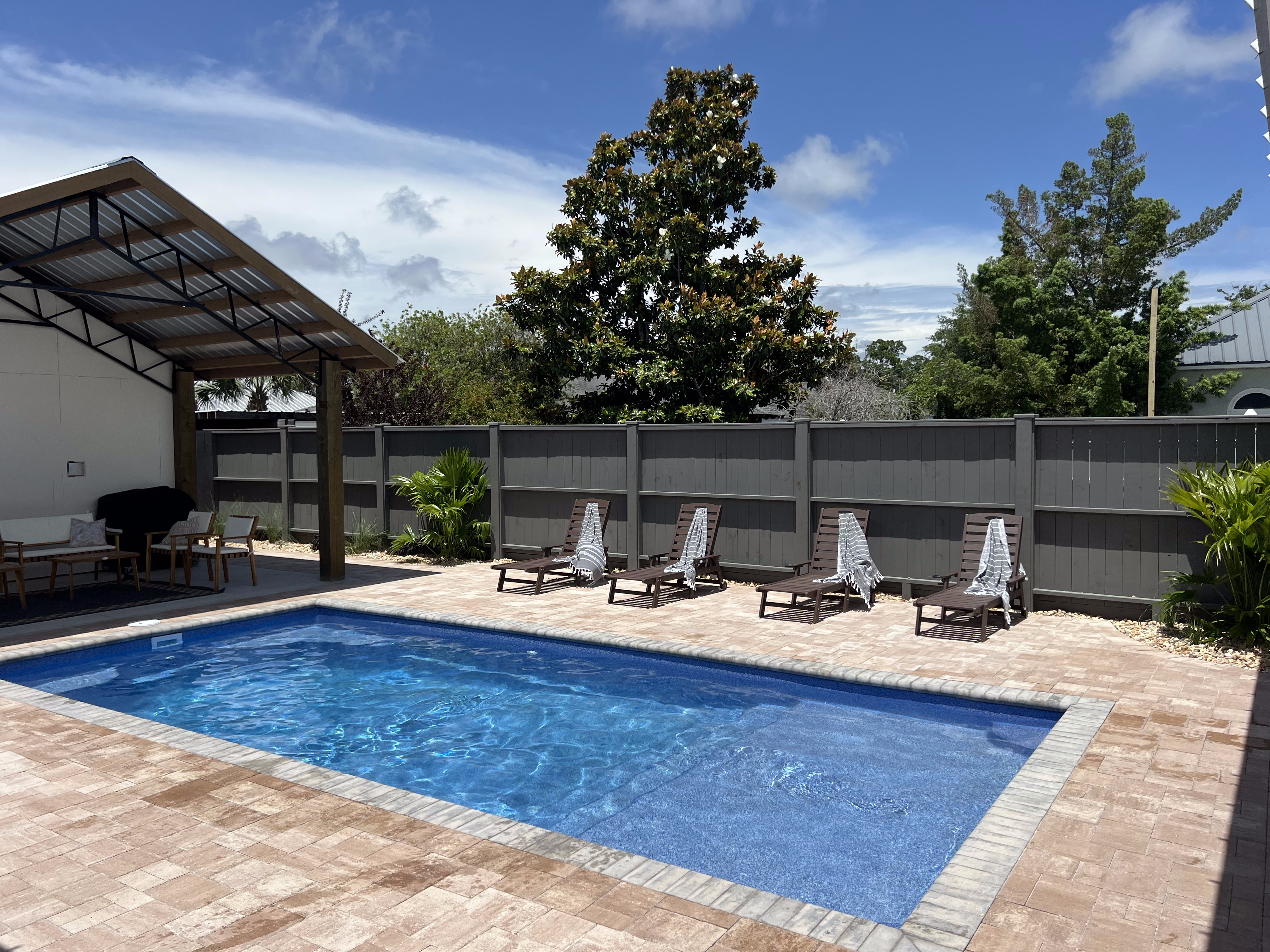 Windsong Rocks pool, cabana, and outdoor living area