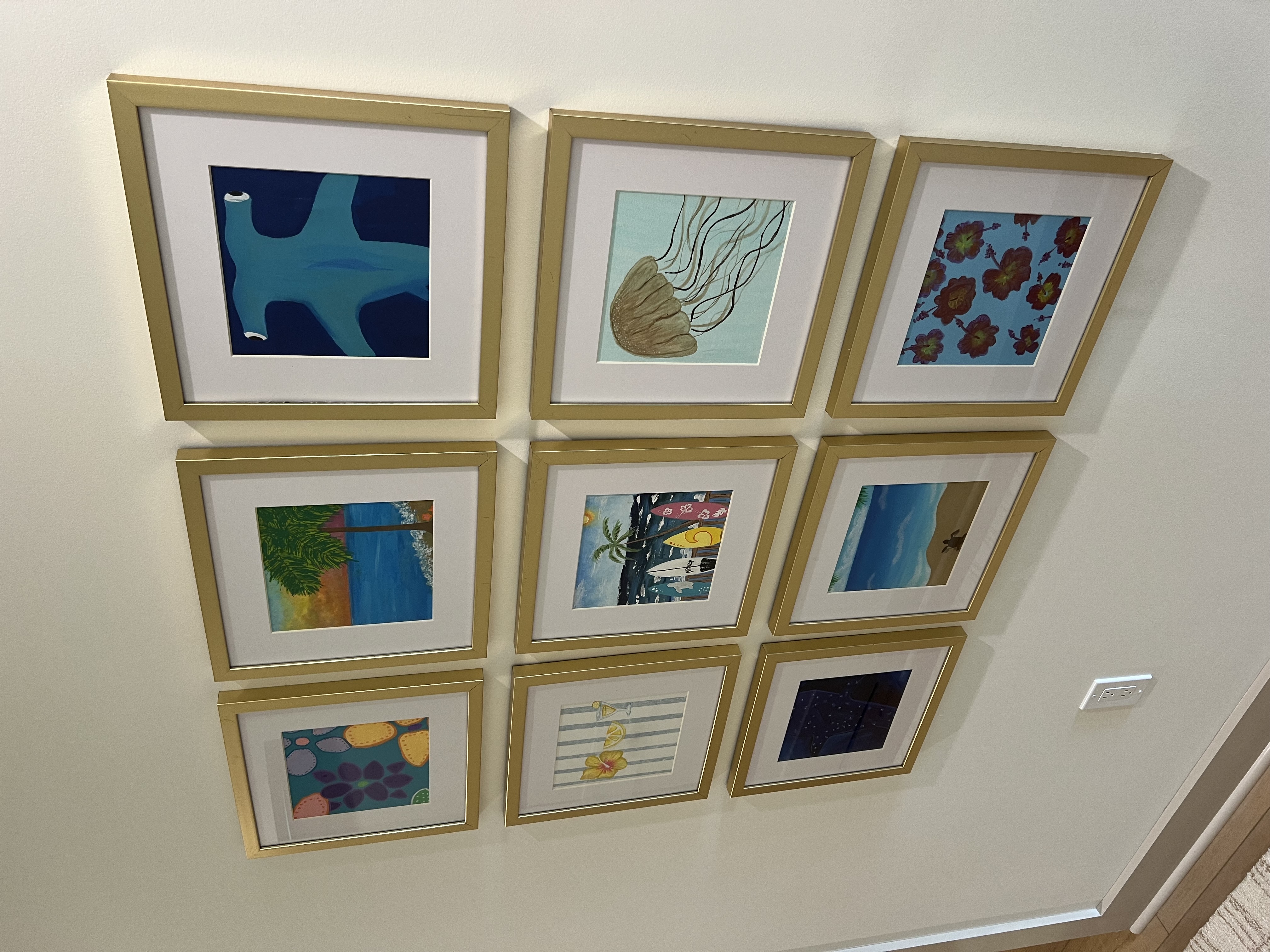 Coastal art gallery wall