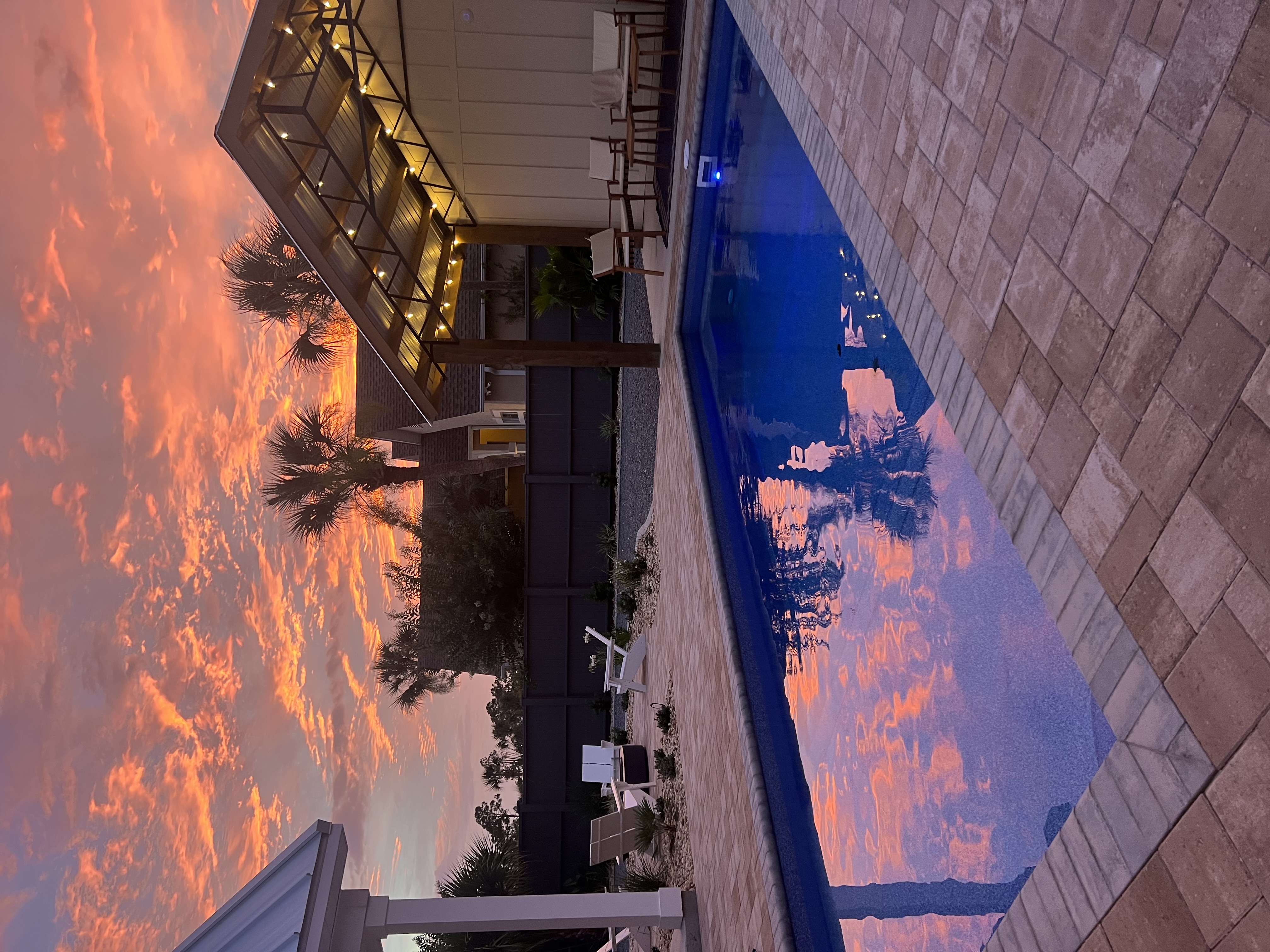 Sunset over the private pool at Windsong Rocks