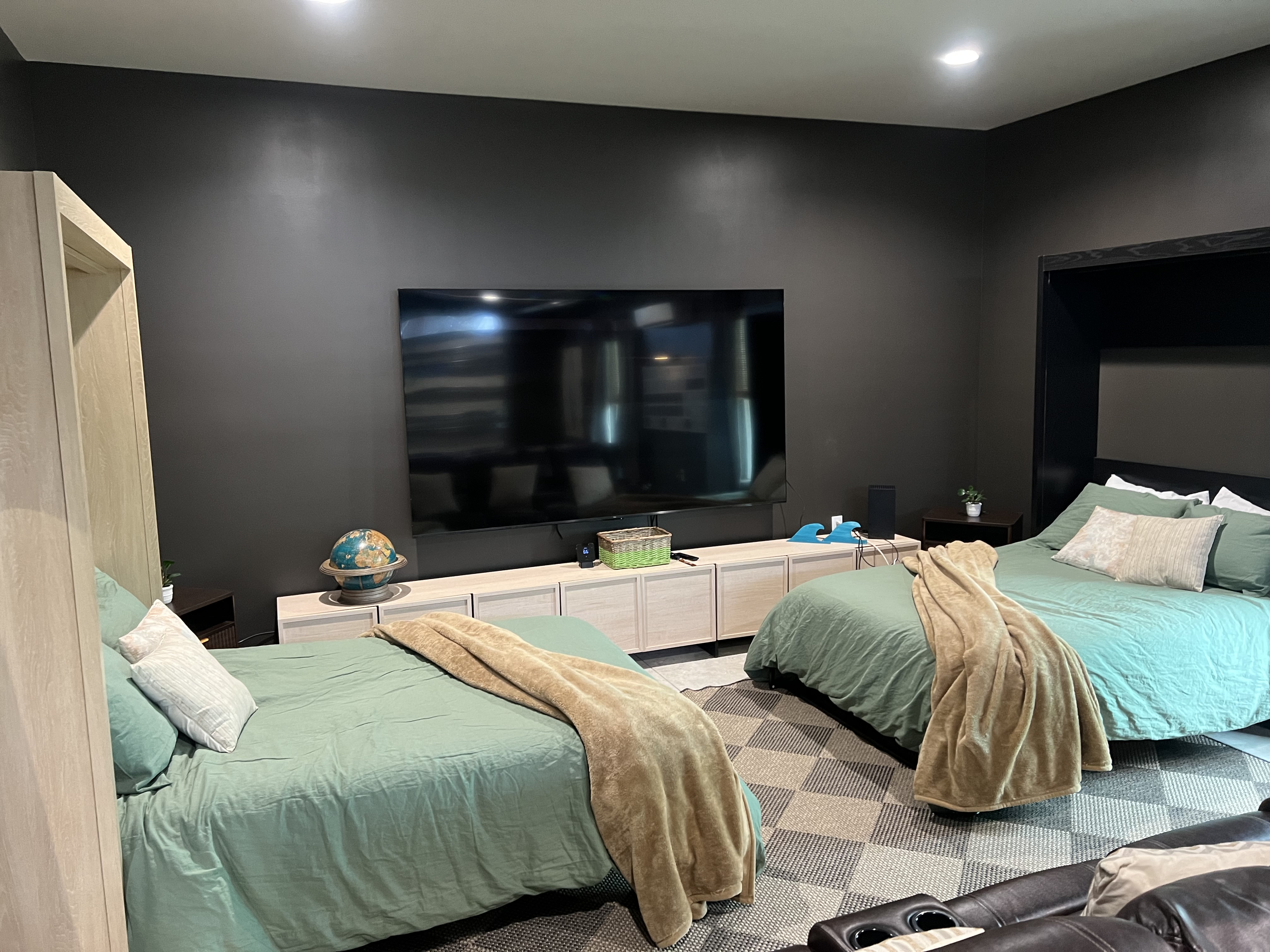 Game room sleeping area with two beds