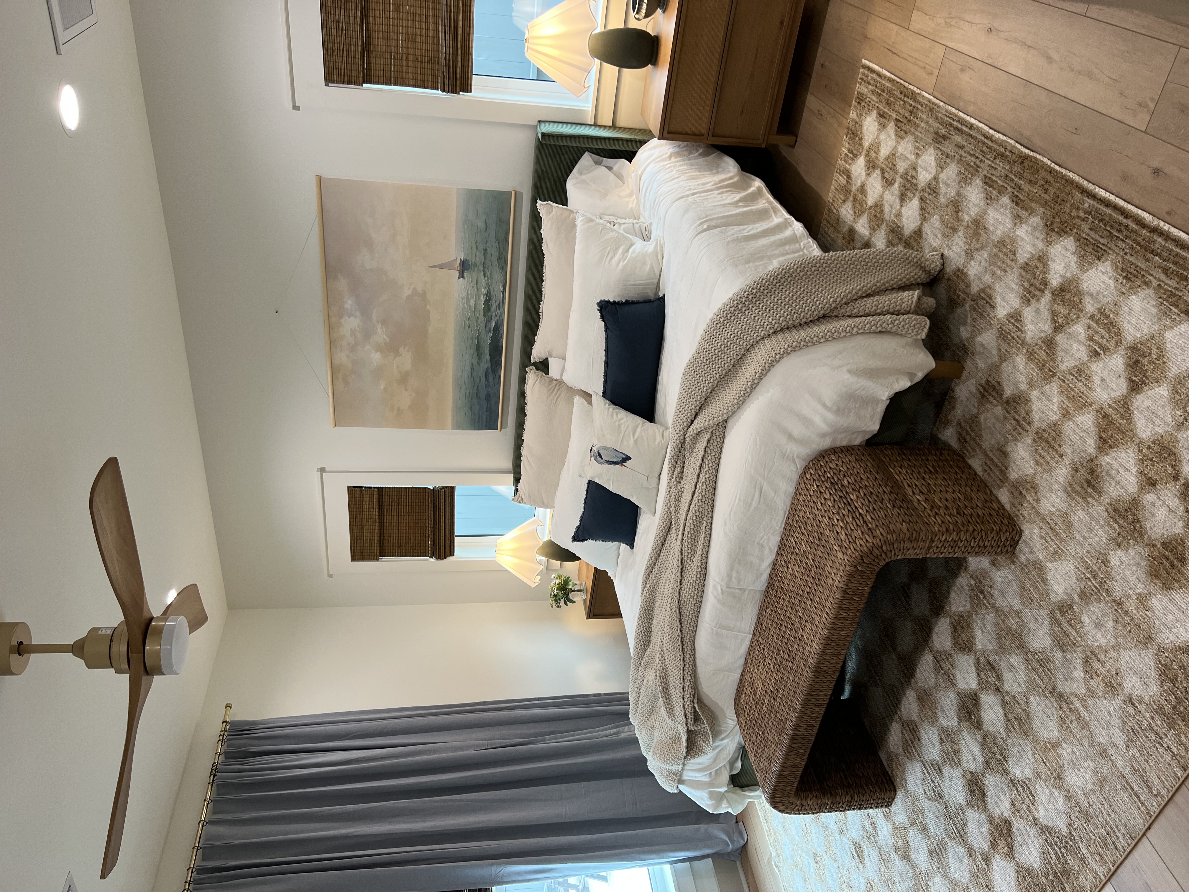 Master bedroom with woven bench