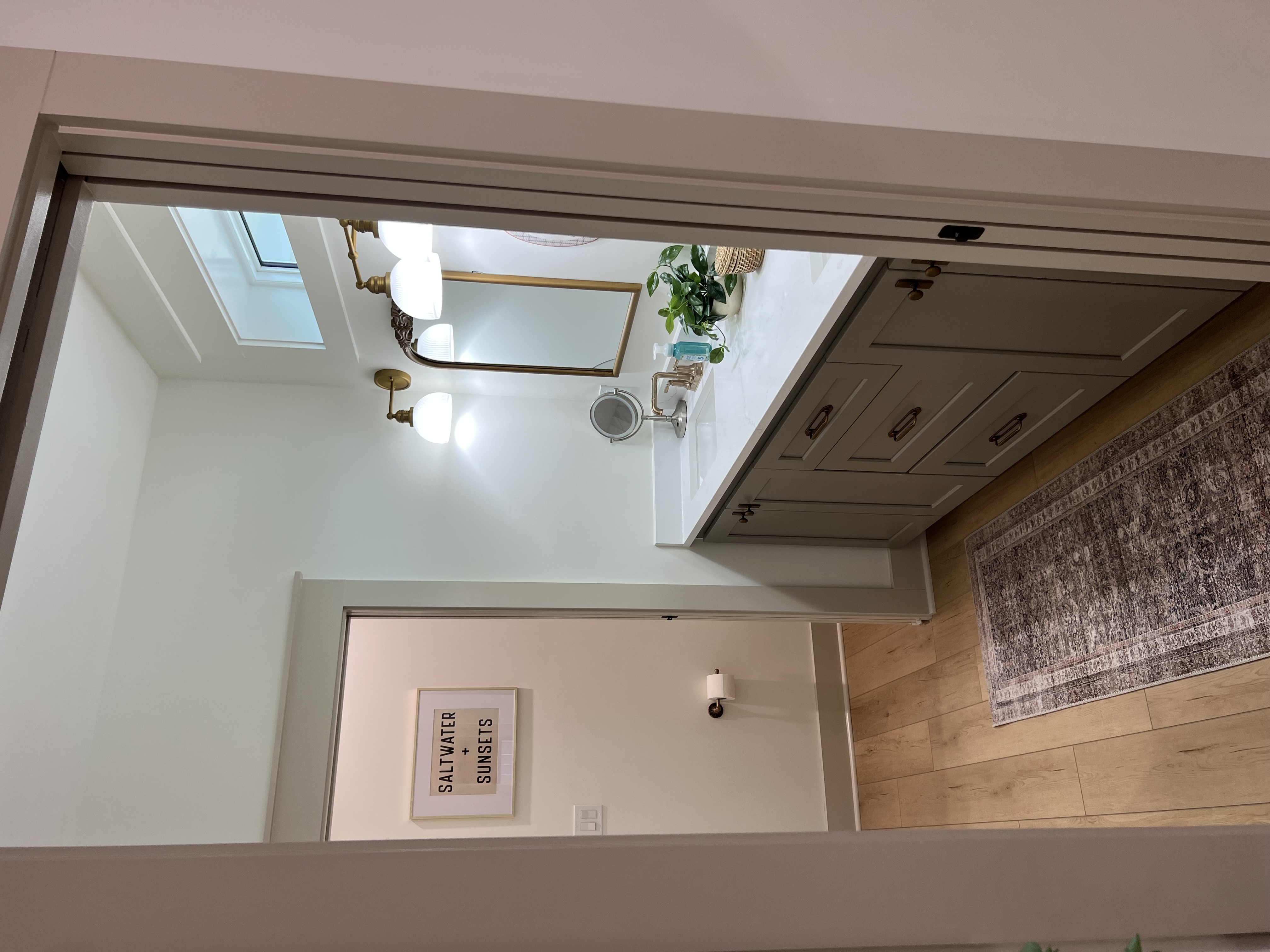 Master bathroom with sage cabinetry