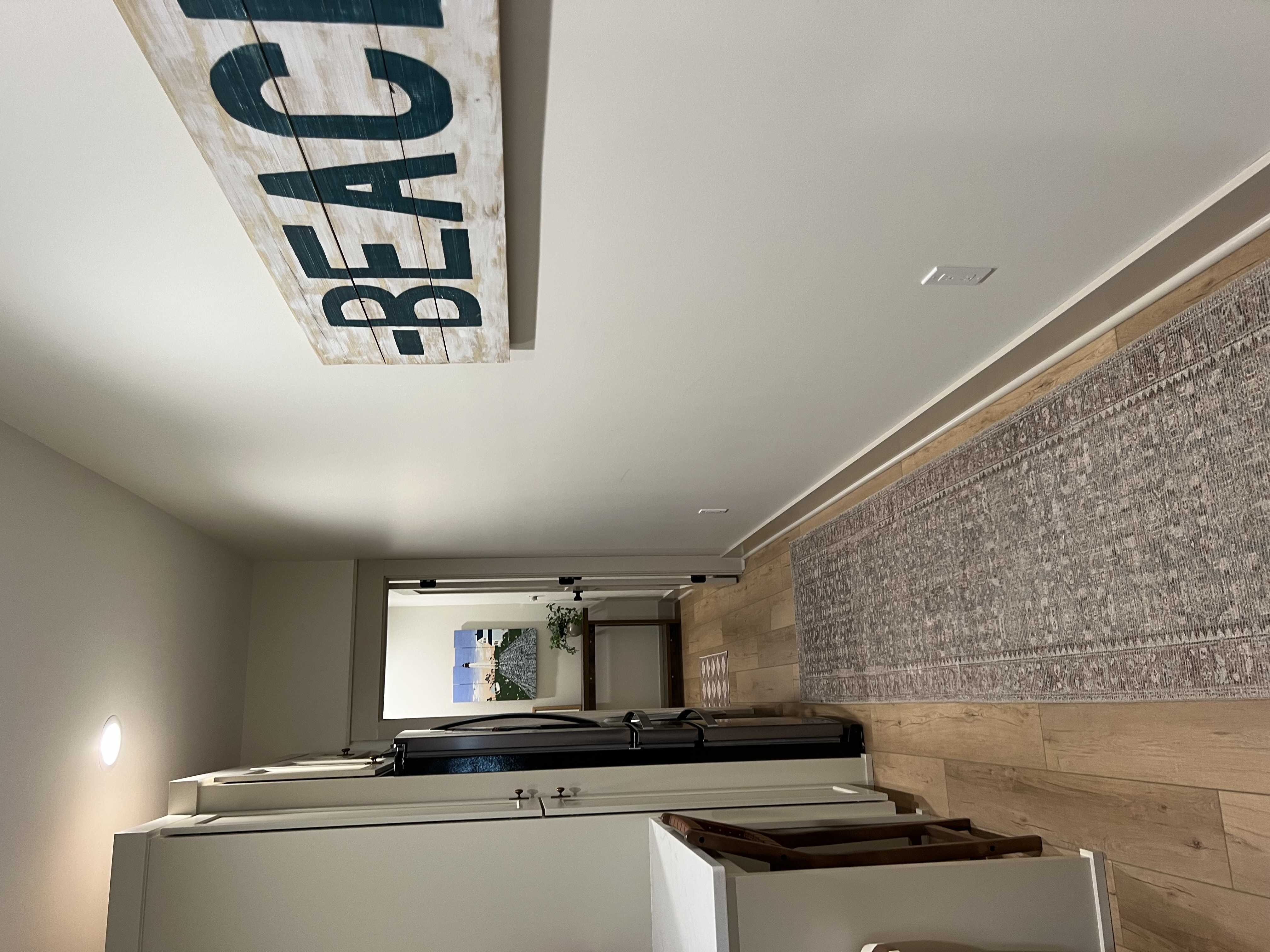 Entry hall with BEACH sign